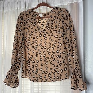 Sheer cheetah print blouse